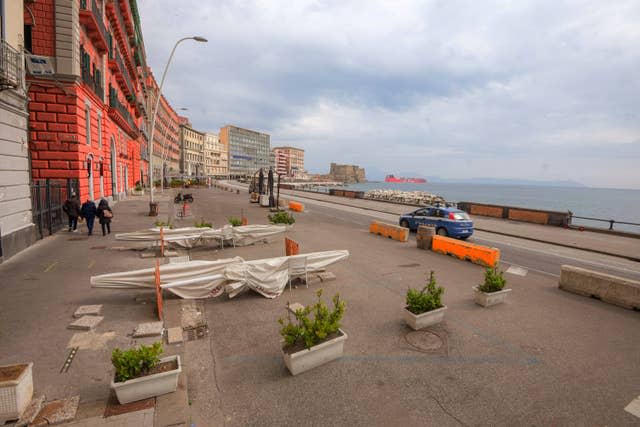 The waterfront in Naples, Italy (Alessandro Pone/AP)