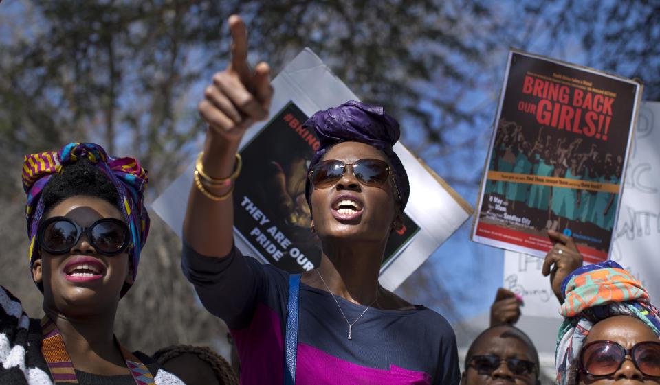 South Africans protest in solidarity against the abduction three weeks ago of hundreds of schoolgirls in Nigeria by the Muslim extremist group Boko Haram and what protesters said was the failure of the Nigerian government and international community to rescue them, during a march to the Nigerian Consulate in Johannesburg, South Africa Thursday, May 8, 2014. The kidnapping has ignited a viral social media campaign that has brought renewed attention to Boko Haram's campaign of violence, and protests around the world. (AP Photo/Ben Curtis)