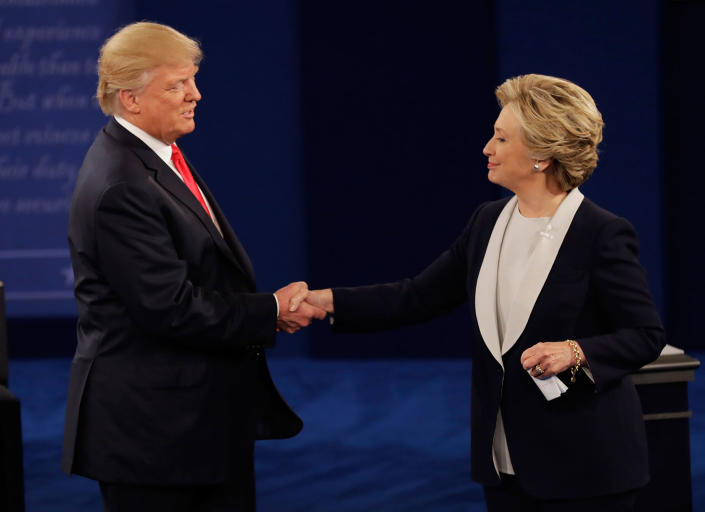 <p>Republican presidential nominee Donald Trump shakes hands with Democratic presidential nominee Hillary Clinton following the second presidential debate at Washington University in St. Louis, Sunday, Oct. 9, 2016. (Photo: Patrick Semansky/AP) </p>