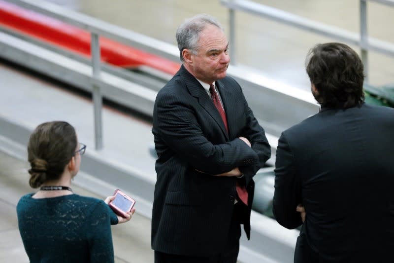Senator Kaine speaks to news reporters at the U.S. Capitol ahead of a series of votes on response to the coronavirus disease (COVID-19) outbreak, on Capitol Hill in Washington