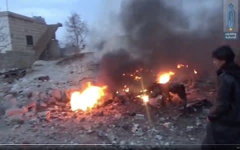 Media affiliated with Hayyat Tahrir al-Sham releases another video showing the wreckage of a Russian jet - Credit: Image grabbed from video tweeted by Michael A. Horowitz Verified account