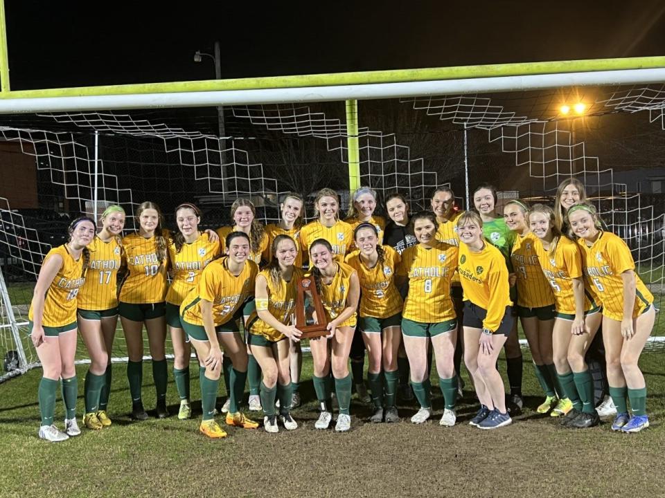 The Pensacola Catholic girls soccer team poses for photos after defeating North Bay Haven Academy 4-2 for the District 1-3A title on Tuesday, Jan. 31, 2023 from Gorecki-LeBeau Stadium in Pensacola.