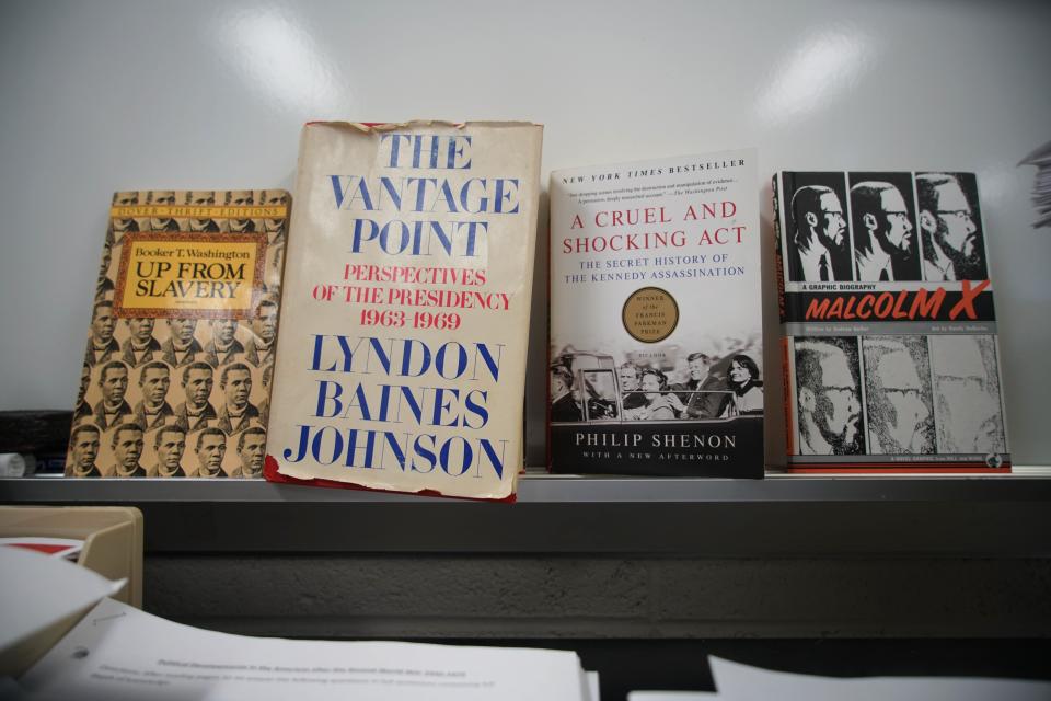 Books about African American history line a smart board at Mt. Pleasant High School.