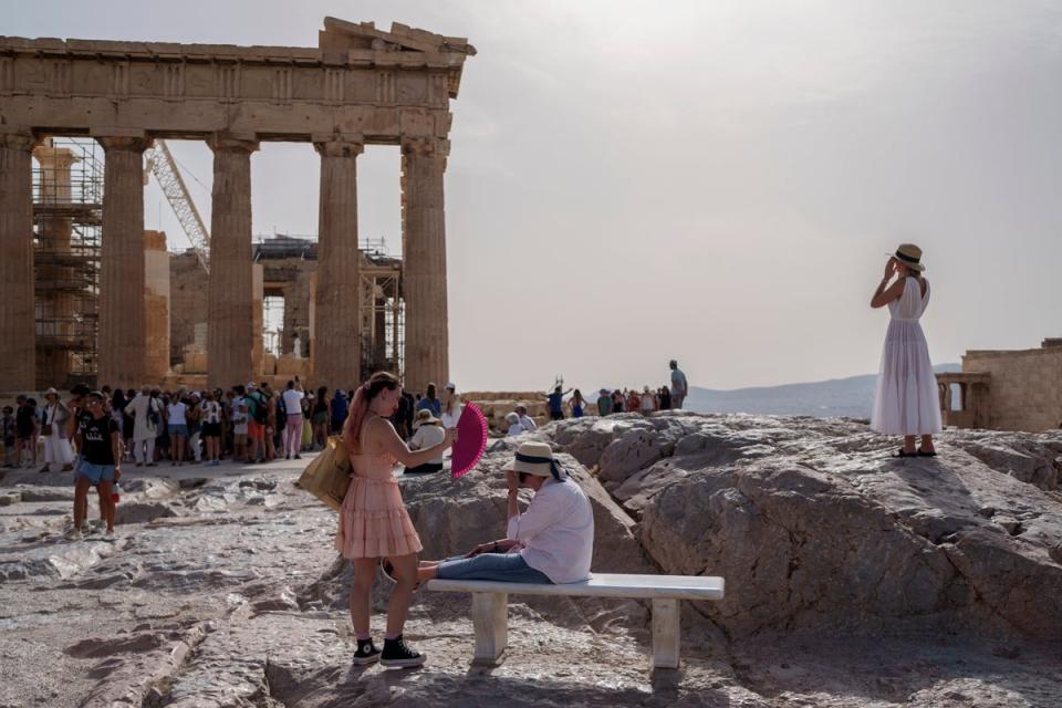 The ancient Acropolis, in Athens, was closed by authorities when temperatures hit 43C (AP)