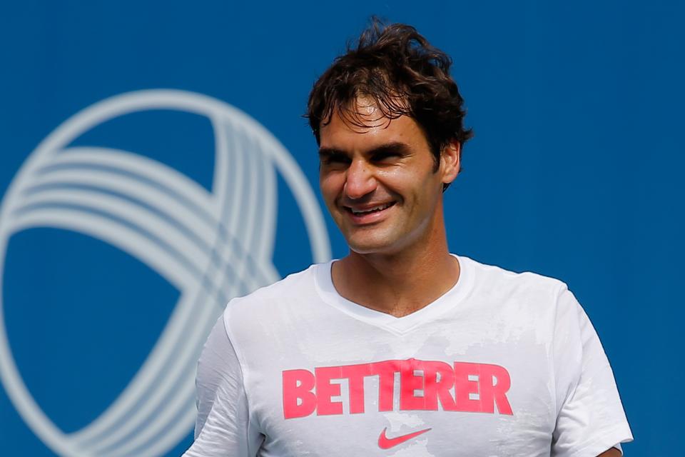 Why is this man smiling during a practice session at the U.S. Open Thursday? Take a look at his draw. (Photo by Chris Trotman/Getty Images for USTA)