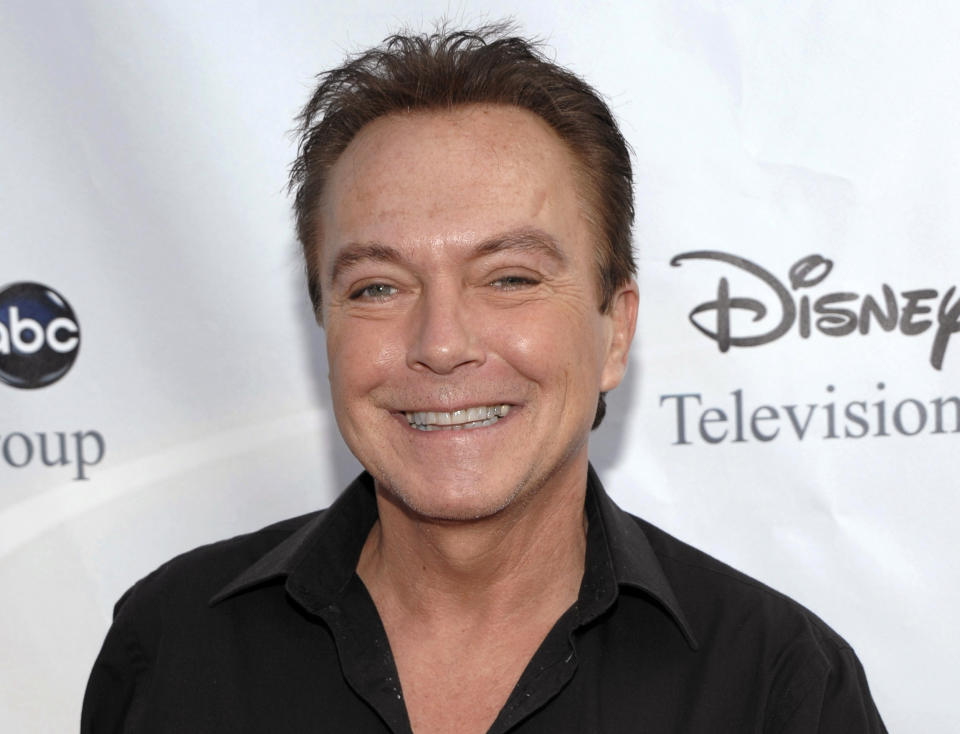 FILE - In this Aug. 8, 2009, file photo, actor-singer David Cassidy arrives at the ABC Disney Summer press tour party in Pasadena, Calif. A South Florida home that once belonged to the 1970's heartthrob has been sold for $2.6 million. Cassidy rose to fame as a teen idol who starred in "The Partridge Family." He died at age 67 in 2017. (AP Photo/Dan Steinberg, File)