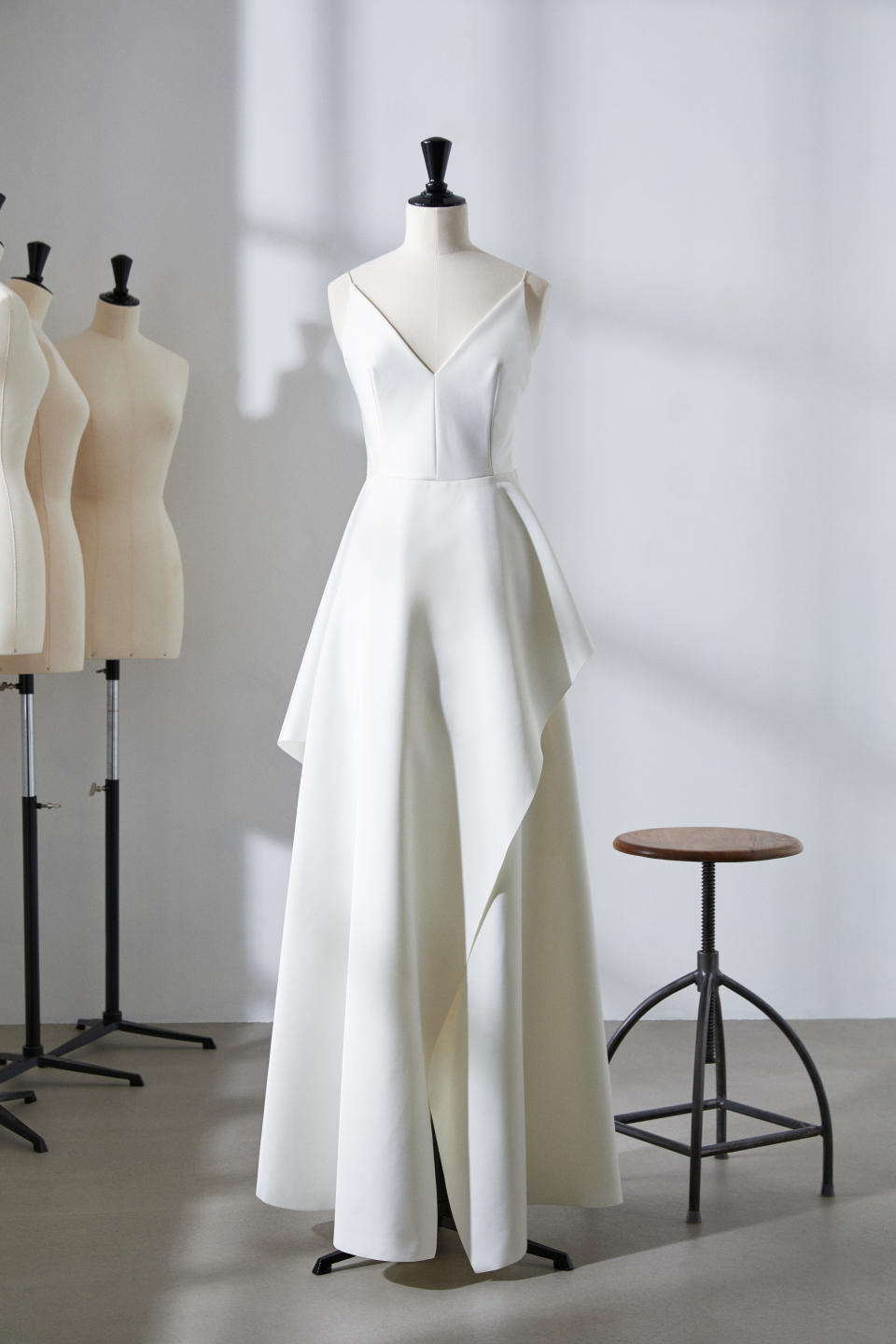 A first look collection showcases two wedding dresses available to rent. [Photo: H&M]