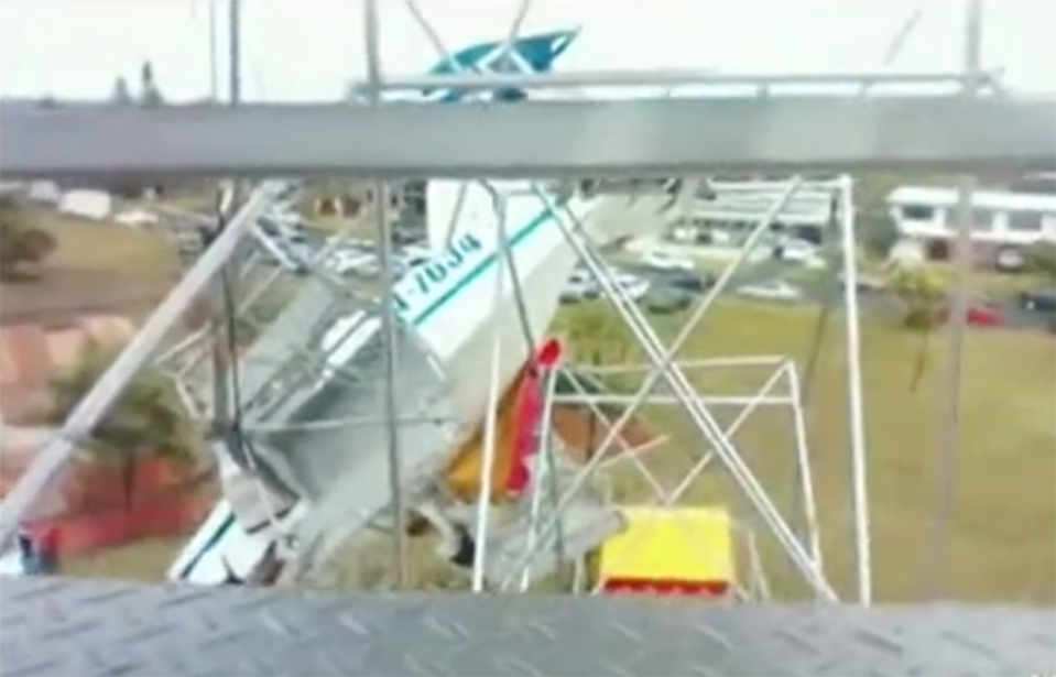 A light aircraft crashed into a Ferris wheel at a fair near Taree in NSW, on October 1, 2011. Source: 7News