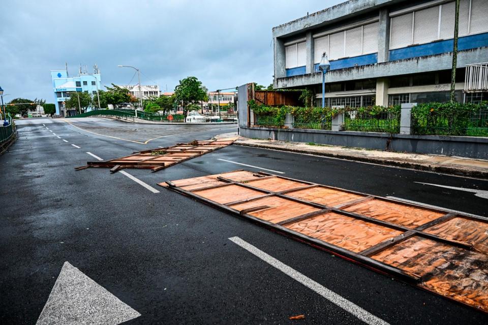 PHOTO: Billboards are seen fallen on the street as hurricane Beryl passes near to Bridgetown, Barbados on July 1, 2024.  (Chandan Khanna/AFP via Getty Images)