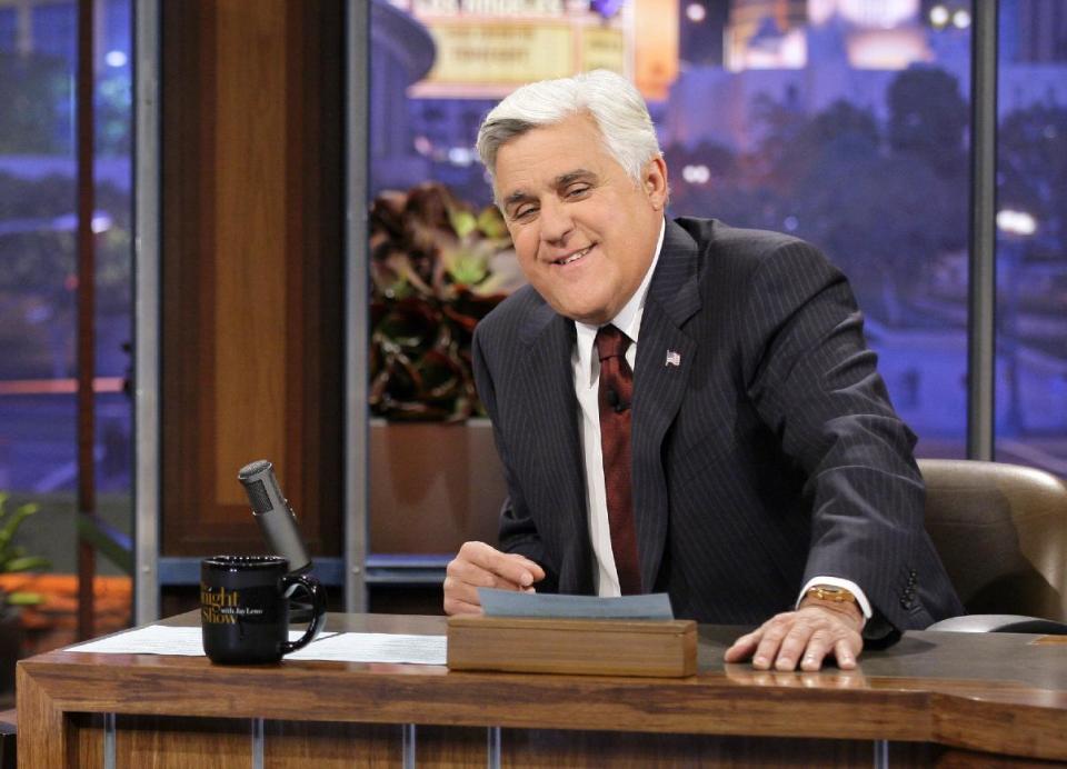 This Nov. 5, 2012 photo released by NBC shows Jay Leno, host of "The Tonight Show with Jay Leno," on the set in Burbank, Calif. During Leno’s two-decade tenure as NBC’s “Tonight” show host, the comic has cracked a total of 4,607 jokes at the expense of President Bill Clinton. The Washington-based Center for Media and Public Affairs counted and catalogued nearly 44,000 jokes Leno made about politics and public affairs during his time at “Tonight,” which ends Thursday.(AP Photo/NBC, Paul Drinkwater)