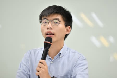 Pro-democracy activist Joshua Wong attends a news conference in Taipei