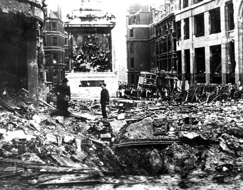 Bomb damage during the Blitz at the Monument to the Great Fire of London in the City of London (PA) (PA Archive)