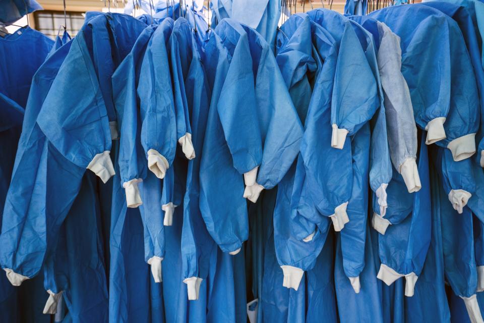 PPE equipment hangs outside tents where Covid-19 patients are being treated at the Tshwane District Hospital in Pretoria, South Africa, Friday July 10, 2020. Health Minister Zweli Mkhize this week said South Africa could run out of available hospital beds within the month. "The storm that we have consistently warned South Africans about is now arriving," he told lawmakers. The African continent overall has over 523,000 confirmed virus cases after passing the half-million milestone on Wednesday. But shortages in testing materials mean the true number is unknown.(AP Photo/Jerome Delay)