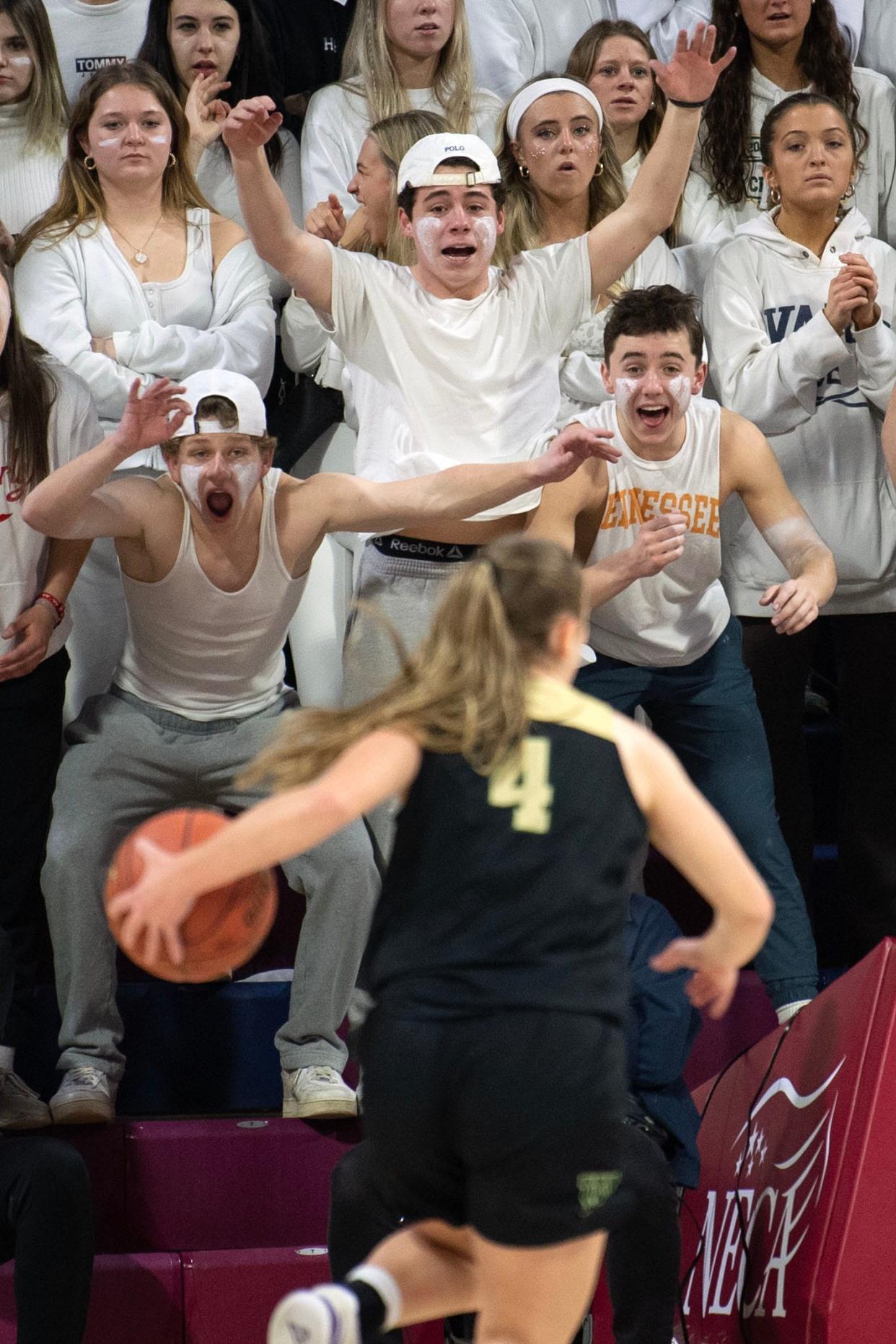 Lansdale Catholic students react to an approaching Archbishop Wood player at the Palestra in Philadelphia on Monday, Feb. 27, 2023. Lansdale Catholic defeated Archbishop Wood in the PCL girls basketball final, 50-47.