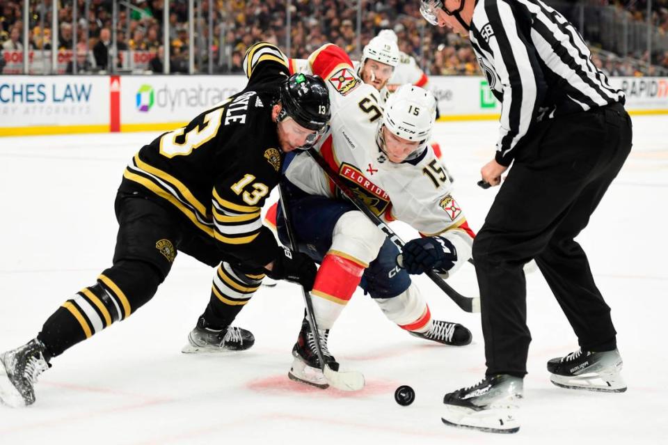 May 17, 2024; Boston, Massachusetts, USA; Boston Bruins center Charlie Coyle (13) and Florida Panthers center Anton Lundell (15) battle for the puck during the second period in game six of the second round of the 2024 Stanley Cup Playoffs at TD Garden.
