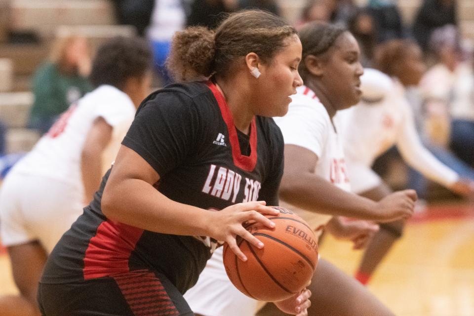 Highland Park's Amelia Ramsey (32) is stepping into a bigger role for the team this year and entered 2023 leading the Topeka-area girls basketball teams in scoring.