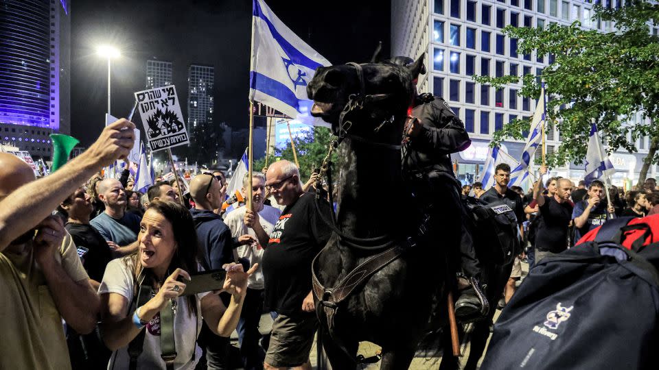 Israeli mounted police deploy during a rally calling for the release of hostages held in Gaza outside the defense ministry headquarters in Tel Aviv on May 11, 2024. - Jack Guez/AFP/Getty Images