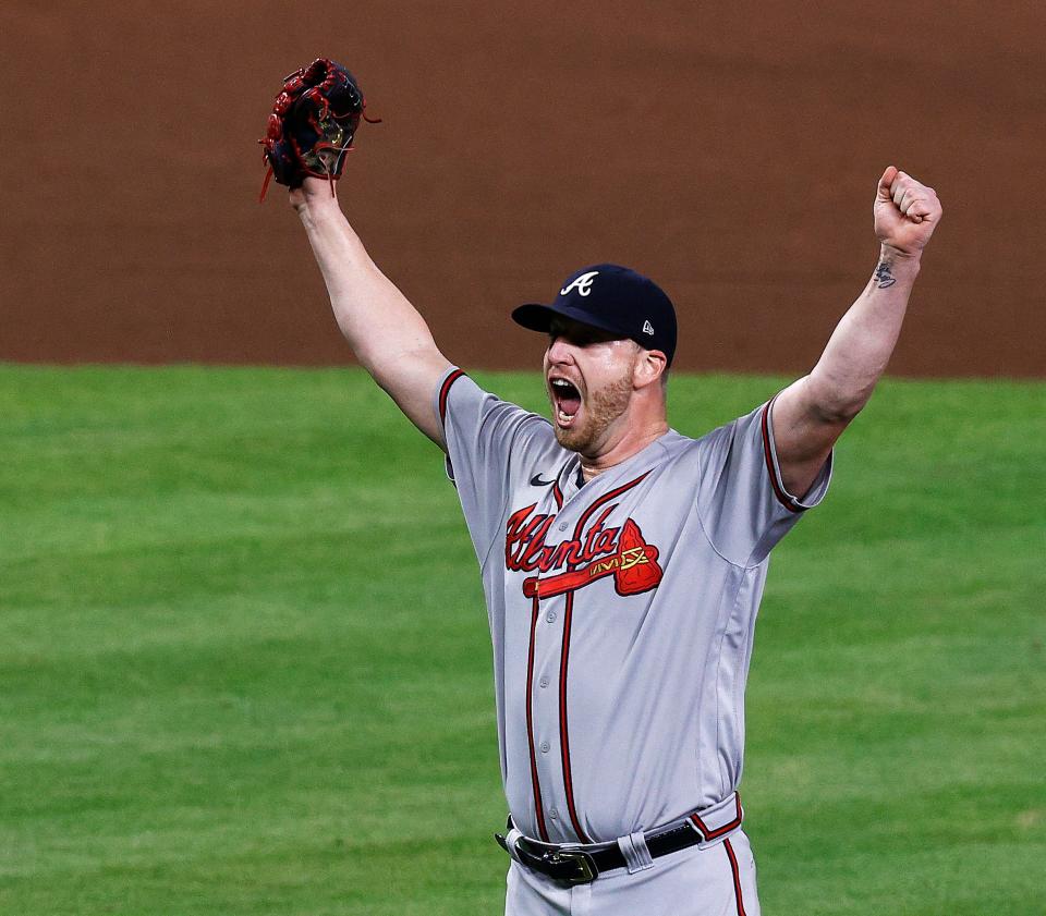 Atlanta Braves relief pitcher Will Smith celebrates the team's win over the Houston Astros in Game 6 of the baseball World Series, Tuesday, Nov. 2, 2021, in Houston. (Kevin M. Cox/The Galveston County Daily News via AP)