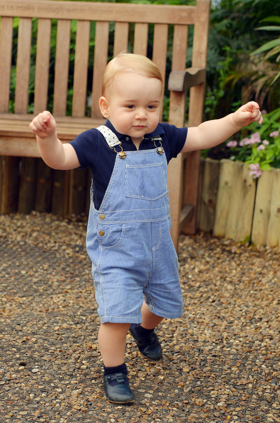 Prince George's wearing striped dungarees on his first birthday at the  Natural History Museum in 2014