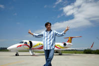 A gleeful Jackie posing in front of his jet. Chan is also the brand ambassador for Embraer, and will promote its jets in the greater China market in particular, as well as the rest of the world. (Photo courtesy of Embraer)