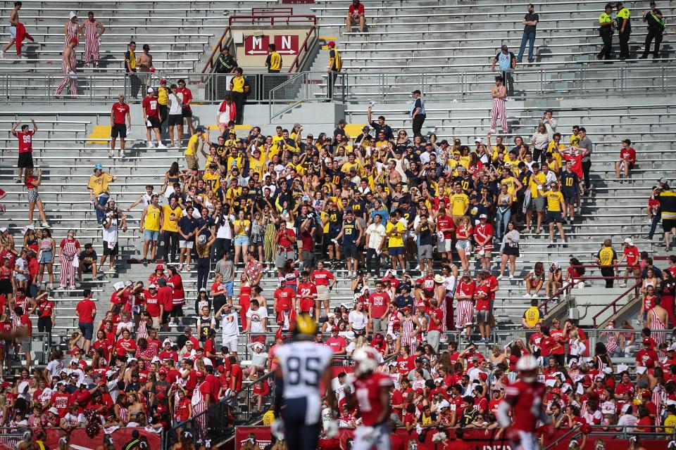 Michigan student fans take over the University of Wisconsin student section of Camp Randall Stadium Saturday, October 2, 2021 early in the 4th quarter after most of Wisconsin fans left the stadium in Madison, Wis. Michigan won the game 38-17. Doug Raflik/USA TODAY NETWORK-Wisconsin