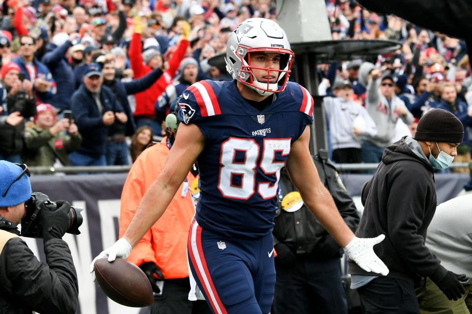 New England Patriots tight end Hunter Henry reacts after scoring a touchdown against the Cleveland Browns during the first half of a game on Sunday, Nov. 14, 2021, at Gillette Stadium in Foxboro.