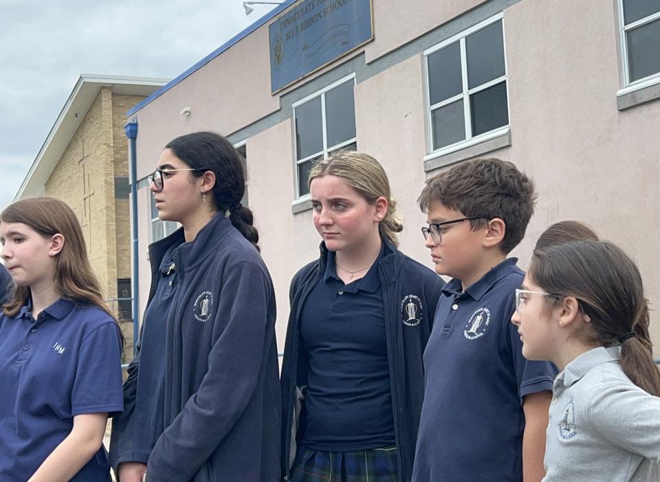 Students at Immaculate Heart of Mary School, including Teagen Norton, center, will be in a new school next year because theirs on Ratzer Road in Wayne is permanently closing.