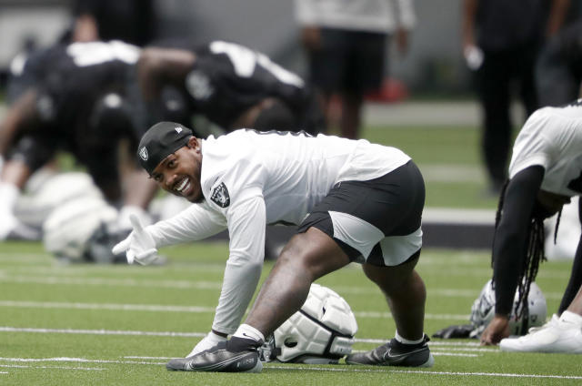 Las Vegas Raiders running back Josh Jacobs warms up before the