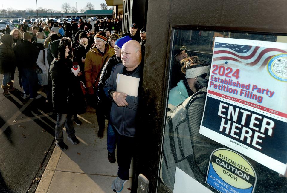 Candidates line up at the Illinois State Board of Elections in Springfield Monday to file for the March 19, 2024 primary election.
