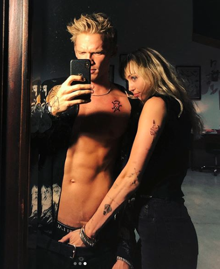 Cody posted this photo of Miley with her hand down his trousers. Photo: Instagram