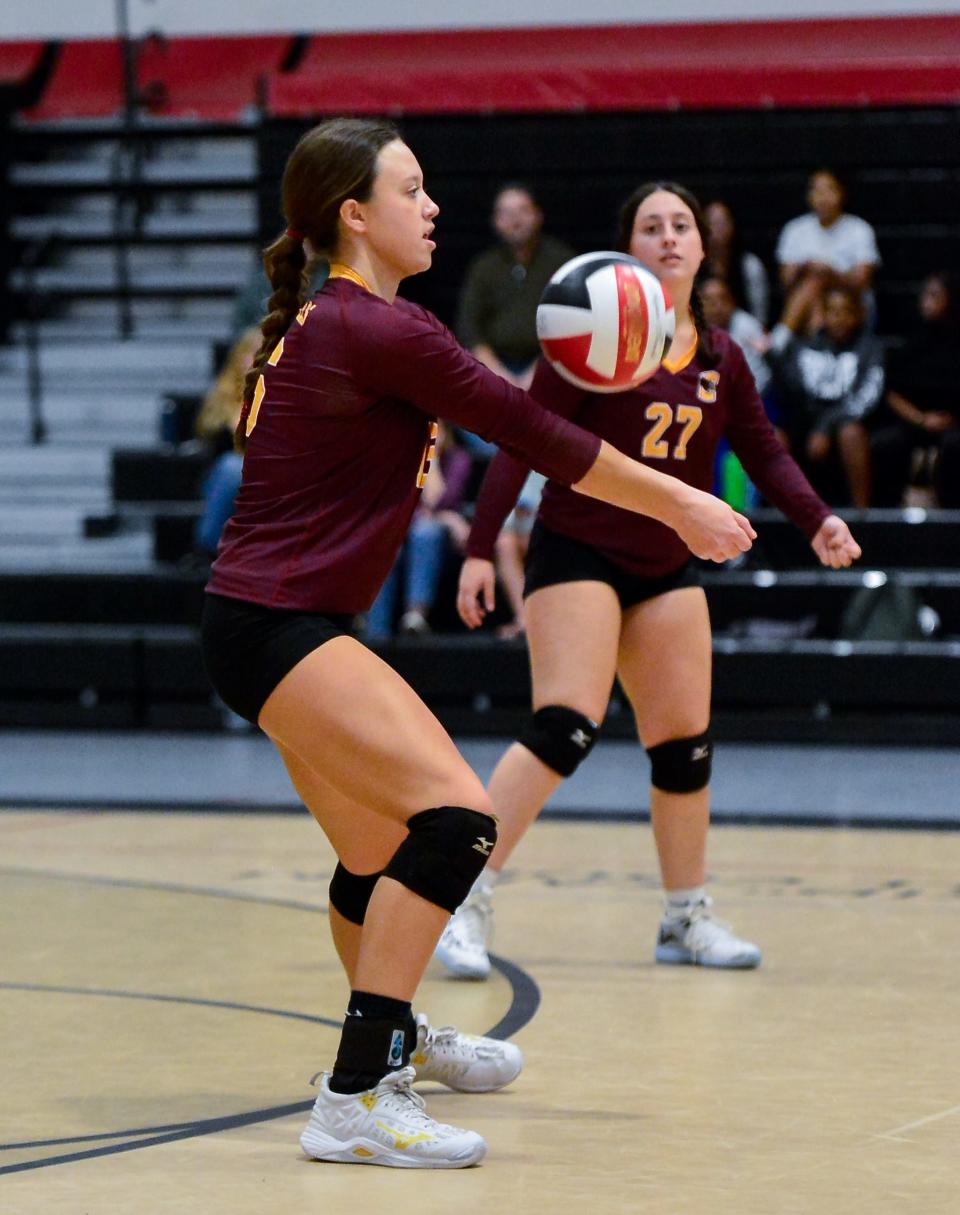 Case’s Hannah Storm sets the ball during Thursday’s game against Durfee.