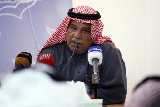 Kuwaiti writer Mohammad Abdulqader al-Jassem speaks during a conference at the Kuwait Society for Human Rights in Kuwait City on January 31, 2011. The foreign ministry said late Tuesday it would take legal action against the prominent opposition writer over an article deemed offensive to leaders in Saudi Arabia and the United Arab Emirates