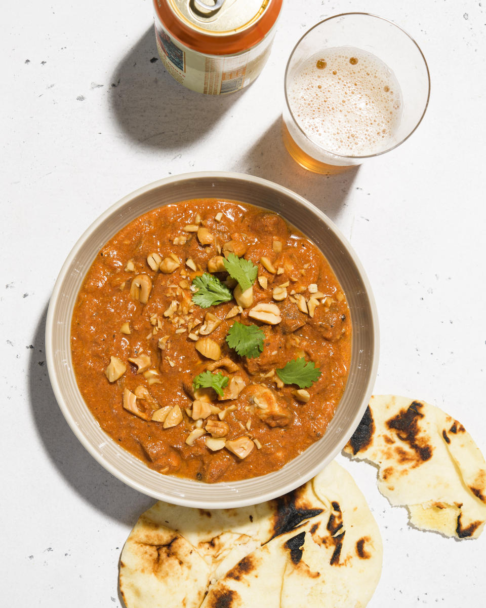 This image released by Milk Street shows a recipe for tomato mushroom curry. (Milk Street via AP)