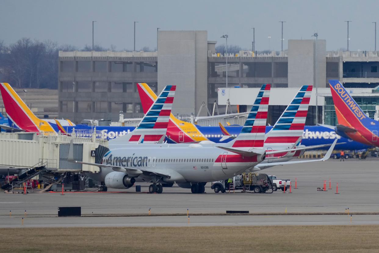 Airliners are parks outside of Terminal A at Cincinnati/Northern Kentucky International Airport in Hebron, Ky., on Wednesday, Jan. 11, 2023. Flight operations across the nation were affected Wednesday morning after Federal Aviation Administration reported a system failure.