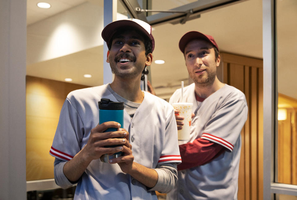 McDonald's Canada customers using a reusable travel mug and paper straw