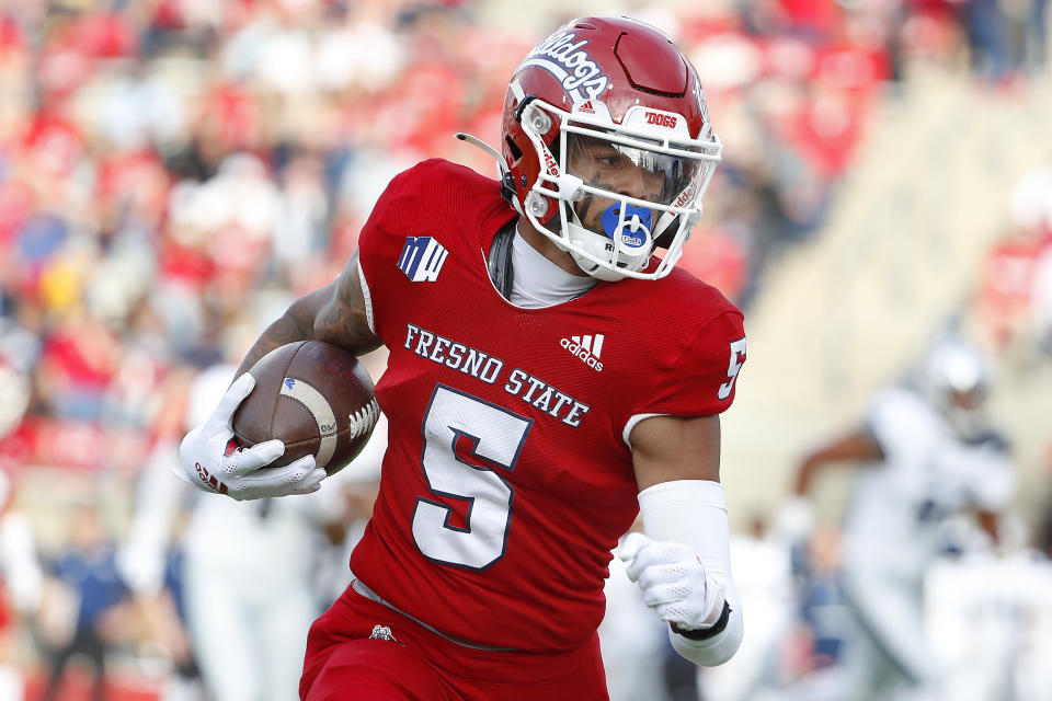 FILE - Fresno State wide receiver Jalen Cropper heads downfield against Nevada during the first half of an NCAA college football game in Fresno, Calif., Oct. 23, 2021. Fresno State goes for the L.A. double over two seasons when it visits Lincoln Riley’s USC Trojans on Sept. 17, 2022. (AP Photo/Gary Kazanjian, File)