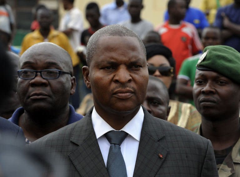 Central African Republic's Prime Minister Faustin Archange Touadera looks on as he takes part in a march for peace in Bangui, on January 5, 2013. President Francois Bozize has sacked Touadera to comply with the terms of a ceasefire deal reached with a rebel coalition during talks in Libreville