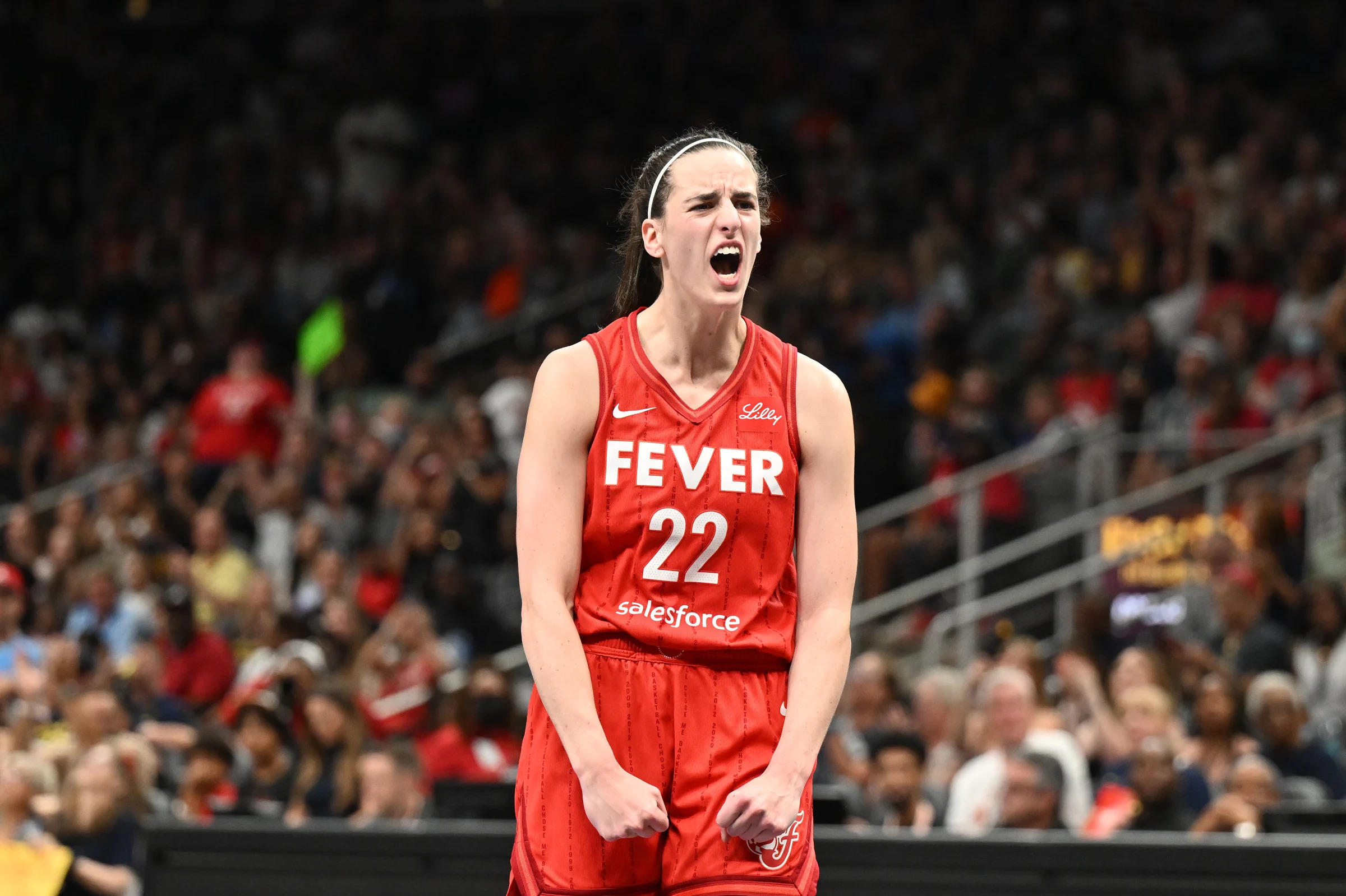 ATLANTA, GEORGIA - AUGUST 26: Caitlin Clark #22 of the Indiana Fever reacts against the Atlanta Dream on August 26, 2024 at State Farm Arena in Atlanta, Georgia. NOTE TO USER: User expressly acknowledges and agrees that, by downloading and or using this photograph, User is consenting to the terms and conditions of the Getty Images License Agreement. (Photo by Paras Griffin/Getty Images)