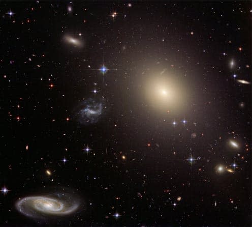 <span class="caption">When galaxies align.</span> <span class="attribution"><span class="source">NASA</span></span>