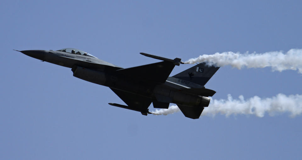 A Pakistani Air Force F-16 fighter jet flies during a military parade to mark Pakistan's Republic Day in Islamabad, Pakistan, Thursday, March 23, 2017. President Mamnoon Hussain said Pakistan is ready to hold talks with India on all issues, including Kashmir, as he opened the annual military parade. During the parade, attended by several thousand people, Pakistan displayed nuclear-capable weapons, tanks, jets, drones and other weapons systems. (AP Photo/Anjum Naveed)
