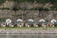 FILE - In this Sept. 1, 2011, file photo, South Korean invested villas line the coastline of the Mount Kumgang resort, also known as Diamond Mountain, in North Korea. North Korean leader Kim Jong Un has ordered the destruction of South Korean-made hotels and other tourist facilities at the North's Diamond Mountain resort, apparently because Seoul won't defy international sanctions and resume South Korean tours at the site, Pyongyang's official Korean Central News Agency said Wednesday, Oct. 23, 2019. (AP Photo/Ng Han Guan, File)