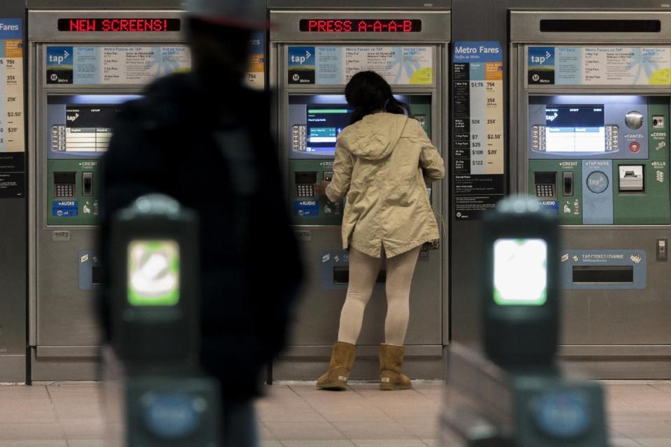 Passengers purchase Metro tickets at Union Station in Los Angeles Wednesday, Jan. 11, 2017. The Los Angeles County Metropolitan Transportation Authority has launched an around-the-clock counseling hotline to provide support to riders who experience unwanted sexual advances. The "It's Off Limits" hotline was unveiled Wednesday. The launch is part of a campaign encouraging riders to report sexual harassment on trains and buses. (AP Photo/Damian Dovarganes)