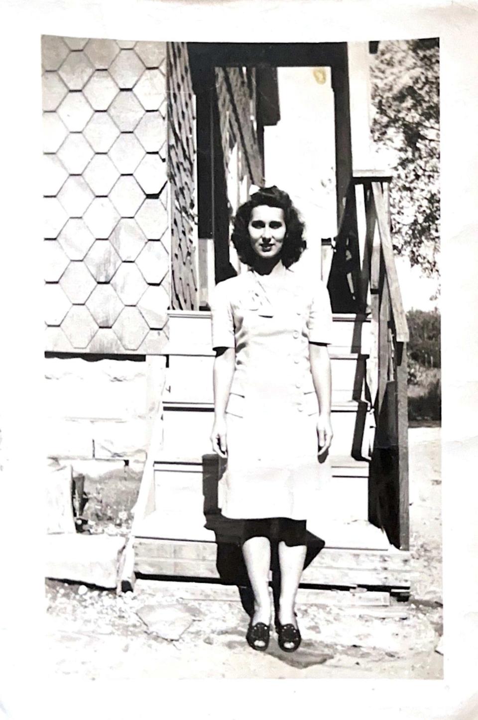 Lifelong Taunton Resident Alice Perry, who will turn 100 on April 8, 2024, stands outside of her home on Oak Avenue in Taunton in 1944.