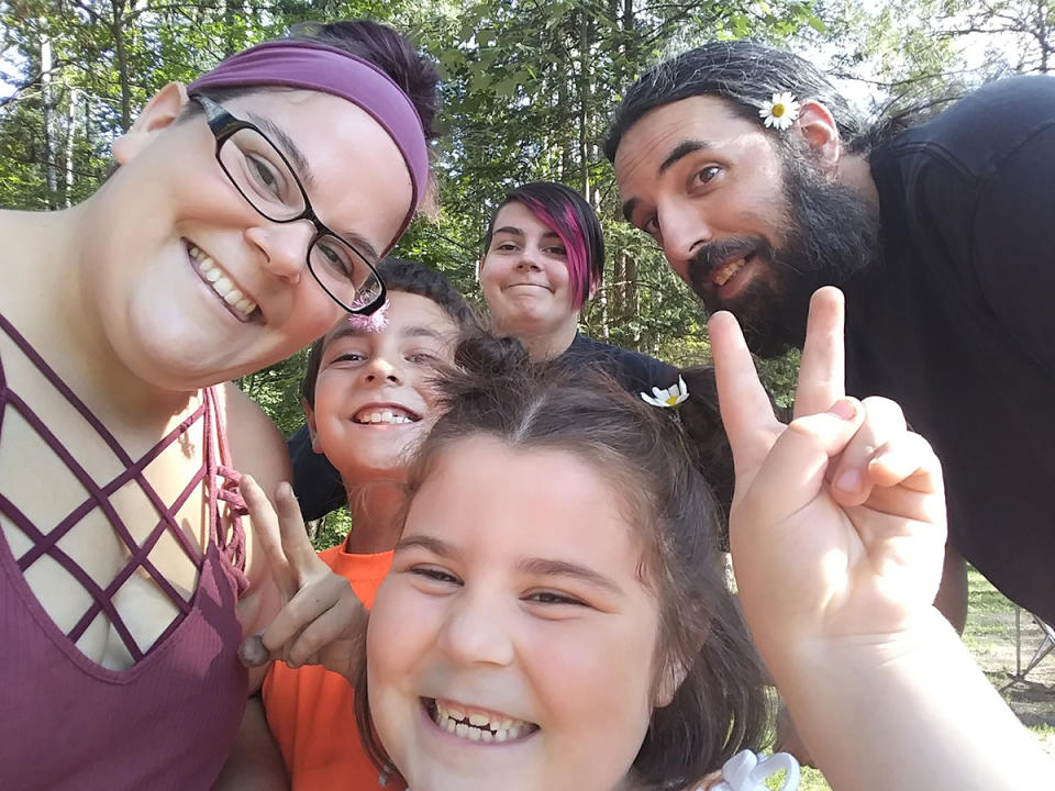 Kristy Maxwell, left, with her family, including Levi, in orange. (Kristy Maxwell)