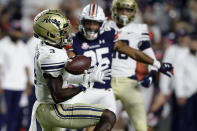 Akron wide receiver Michael Mathison (3) bobbles a punt reception during the second half of the team's NCAA college football game against Auburn on Saturday, Sept. 4, 2021, in Auburn, Ala. (AP Photo/Butch Dill)