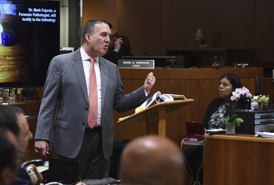 Deputy District Attorney John Lewin gestures during the second day of opening statements of Robert Durst's murder trial at the Airport Branch Courthouse in Los Angeles during his murder trial at the Airport Branch Courthouse in Los Angeles on Thursday, March 5, 2020. After a Hollywood film about him, an HBO documentary full of seemingly damning statements, and decades of suspicion, Durst is now on trial for murder. In opening statements Thursday, prosecutors argued Durst killed his close friend Susan Berman before New York police could interview her about the 1982 disappearance of Durst's wife. (Robyn Beck/AFP via AP, Pool)