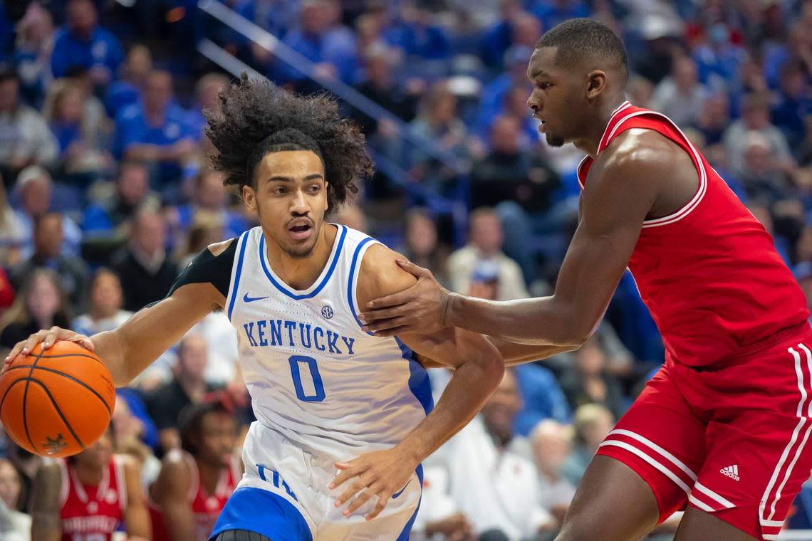 Jacob Toppin dribbles the ball during a game against Louisville at Rupp Arena in Lexington, Ky., on Saturday, Dec. 31, 2022.