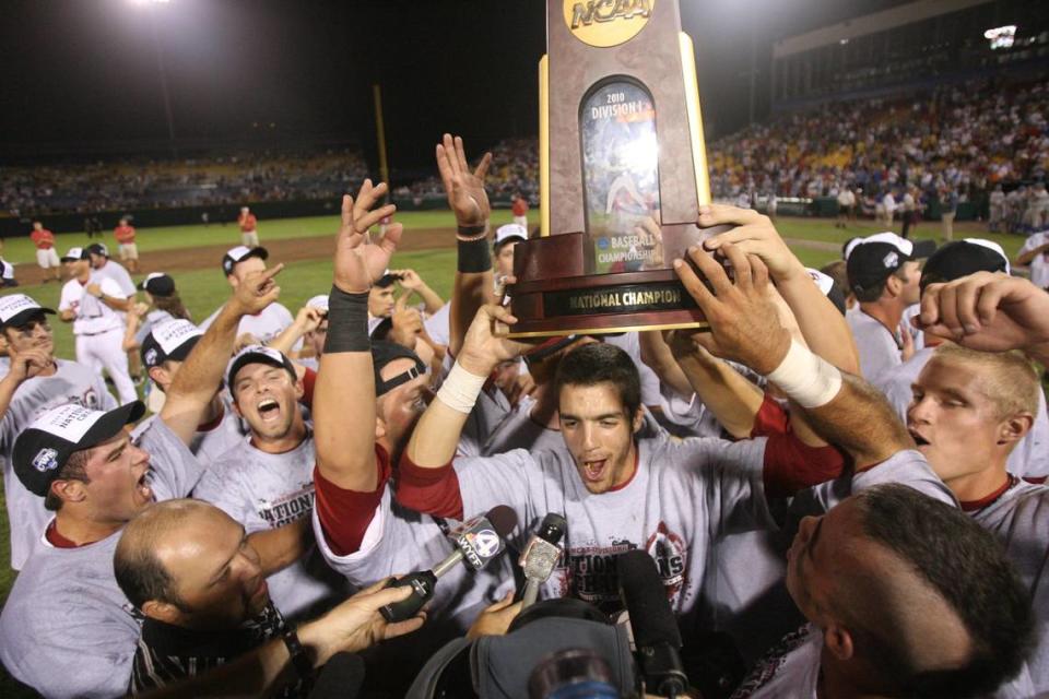 USC’s Bobby Haney holds the Championship trophy up after their win over UCLA during game two of the 2010 College World Series finals between South Carolina and UCLA at Rosenblatt Stadium in Omaha, Neb, Tuesday, June 29, 2010.