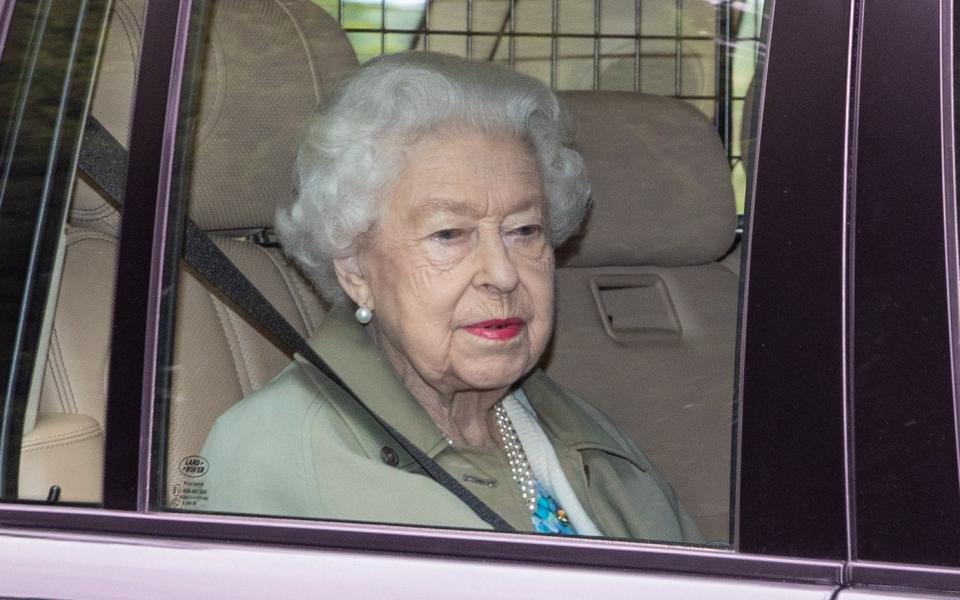 The Queen looks pensive on the journey back from Sandringham to Windsor on Wednesday - Bav Media 