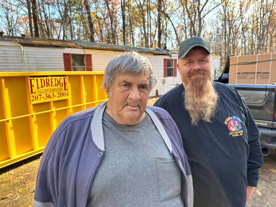 Former Eliot police chief and Purple Heart veteran Tom Barr's (left) home is filled with black mold, enough so his friend Wayne Avery (right) has rallied community members to find him a new mobile home to replace it.